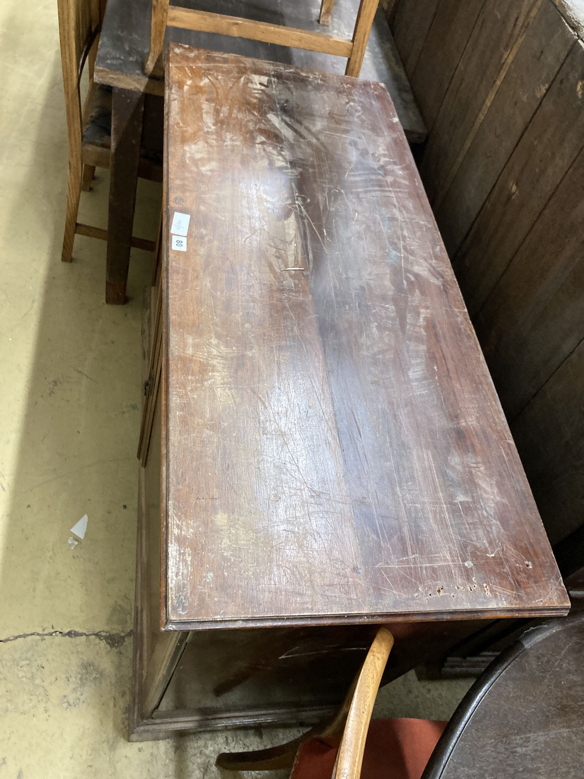 An Edwardian mahogany two door cabinet, length 122cm, depth 51cm, height 86cm